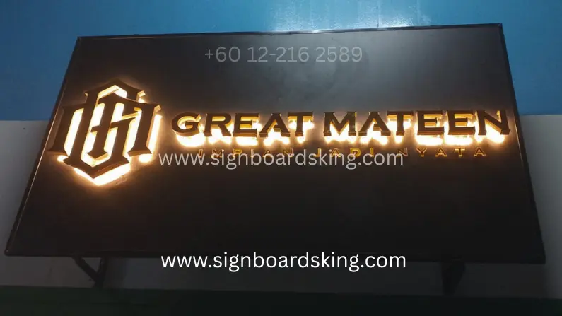 Premium gold 3D Backlit Halo Signage for Great Mateen with warm LED illumination on black background.