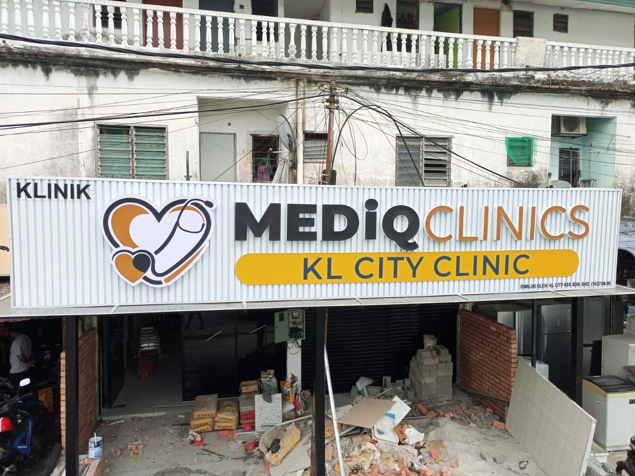 3D box up ceiling strip signage for MEDIQ Clinics KL City Clinic with integrated LED lighting, modern interior clinic signage design in Kuala Lumpur Malaysia