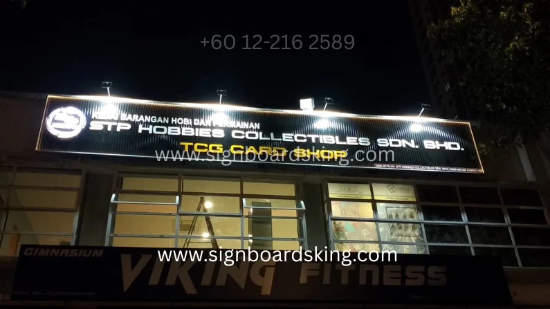 Custom 3D frontlit signboard for STP Hobbies Collectibles Sdn Bhd TCG Card Shop with LED illuminated lettering and premium black background in Malaysia