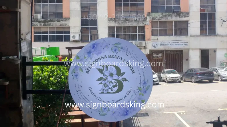 Round Lightbox Signboard Beladonna Beauty Room dengan logo bunga elegan dan pencahayaan LED berkualiti tinggi