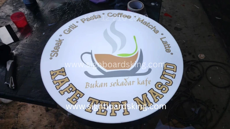 Round lightbox signboard for Kafe Tepi Masjid with LED lighting and modern cafe branding design in Malaysia.